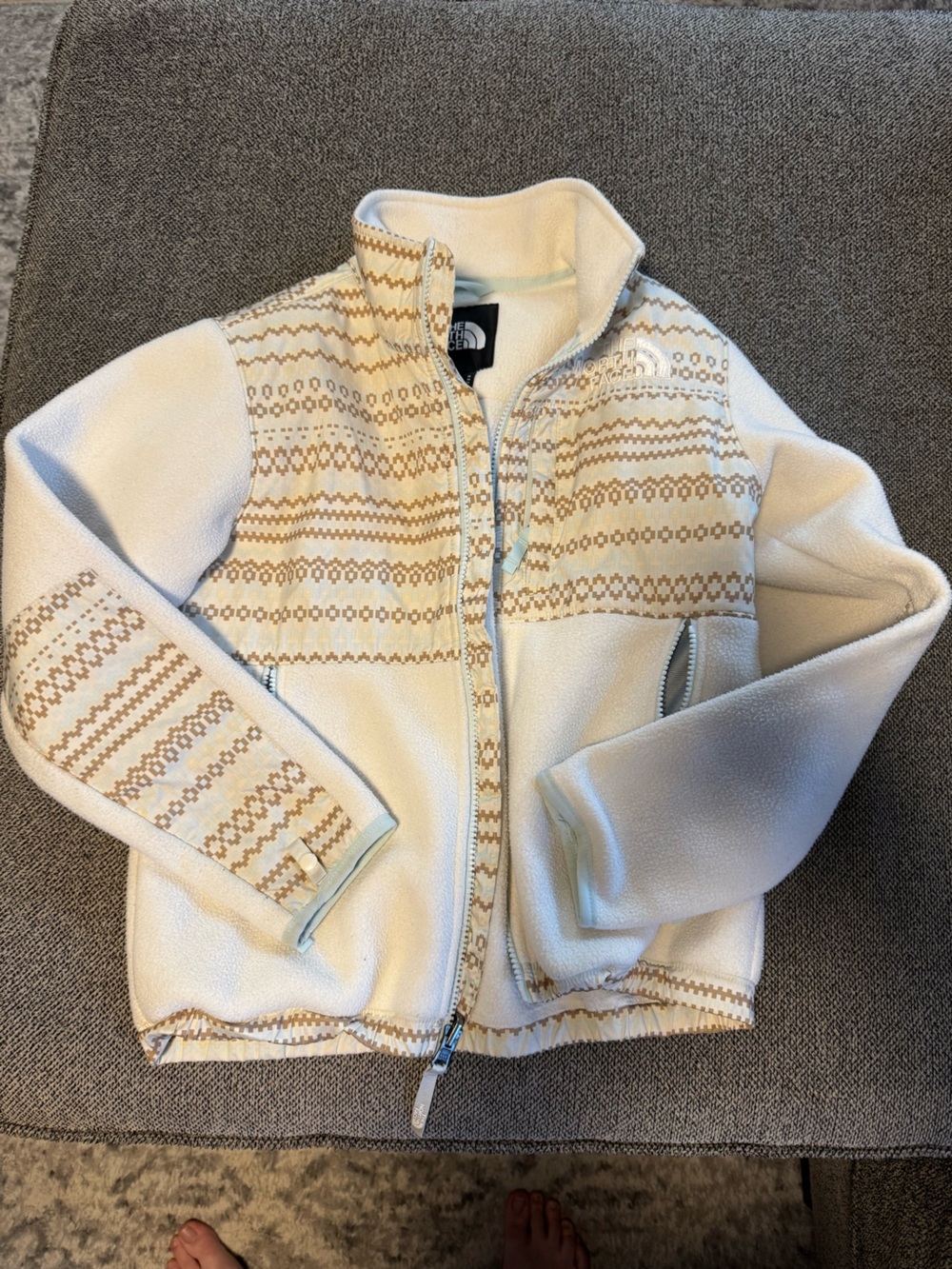 The North Face Off-White Sherpa Fleece Jacket with Black Logo